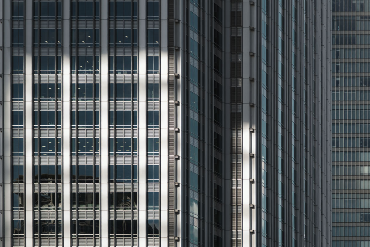 Afternoon sunlight reflecting on the building’s glass facade